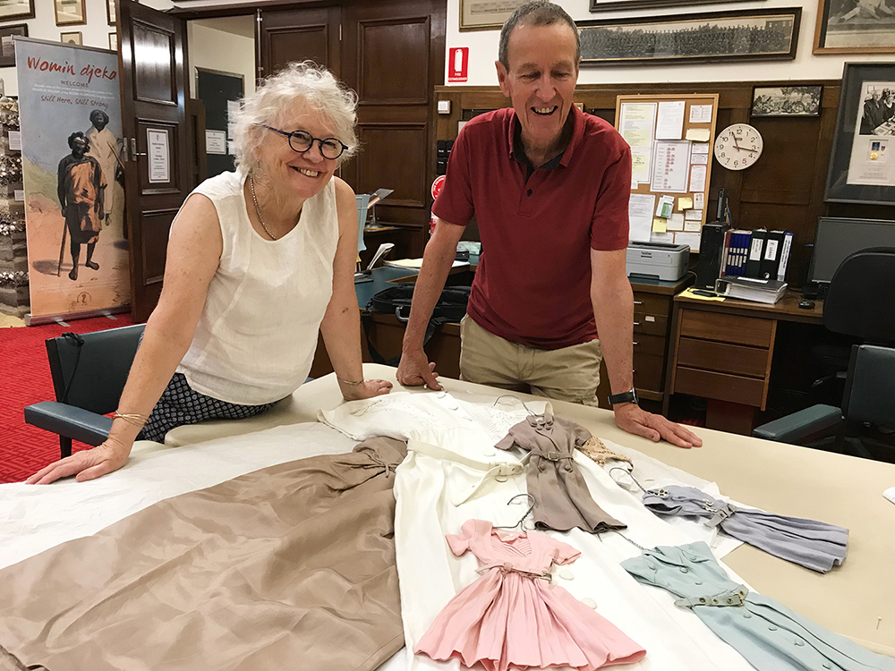 Judy and Ken Paynter with some of the treasures of their collection: four doll-sized replicas of Gala's most popular 1956 styles.